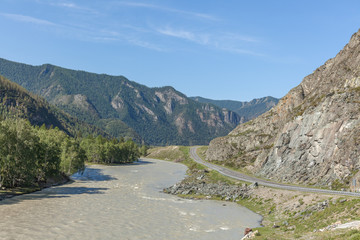White mountain river in Altai. Altay where Russia, China, Mongolia, and Kazakhstan come together, and where the rivers Ob and Irtysh have their headwaters. Russia