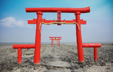 A gateway at the entrance to a shrine which there is in the Japanese sea