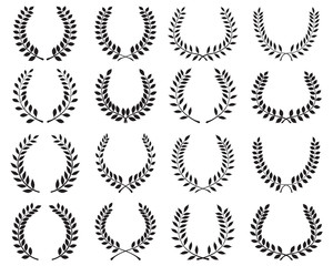Black silhouettes of laurel wreaths  on a white background