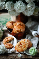 Jam filled hand pies. .Dark rustic photo