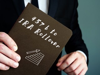 Financial concept about 457b to IRA Rollover with sign on the sheet.