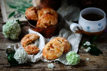 Jam filled hand pies. .Dark rustic photo