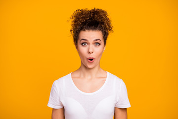 Closeup photo of attractive charming lady pretty brown small curls hairstyle bun open mouth listen cool nice news wear casual white t-shirt isolated bright yellow color background