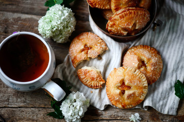 Jam filled hand pies. .Dark rustic photo