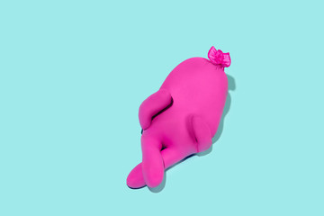 Life of rubber glove - protective wear isolated on blue studio background with copyspace for ad. Must have during pandemic, epidemic, for protection and cleaning. Funny look from the inside.