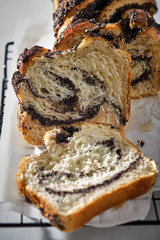 Swirl brioche with poppy seeds. Easter bread. Poppy seed braided or roll bread, Babka. Traditional Polish sweet Christmas bread.