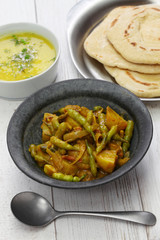 Sengri aloo ki sabzi, simmered radish pods & potatoes with spices, indian cuisine