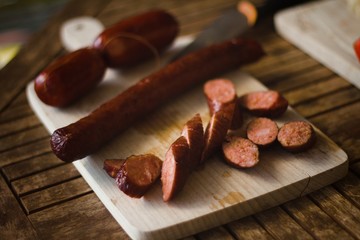 smoked sausage on a wooden board