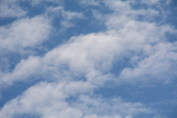 Fototapeta premium Beautiful white clouds floating in a blue sky