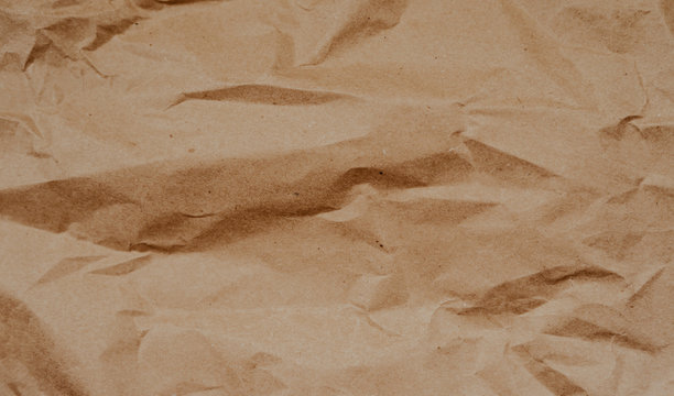 Close up brown paper texture and background. Crumpled Beige Paper Texture. 