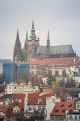Fototapeta premium Panorama of the Old Town of Prague, Czech Republic, with a focus on Hradcany hill and the Prague Castle with the St Vitus Cathedral (Prazsky hill) seen from the Vltava river. 