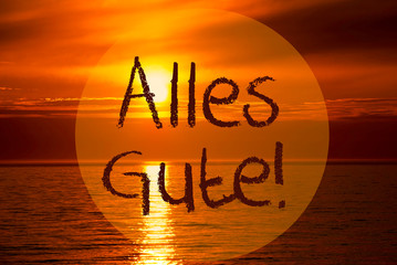 German Text Alles Gute Means Best Wishes. Romantic Sunset Or Sunrise At Sea Or Ocean In The...
