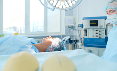 Man surgeon at work in operating room