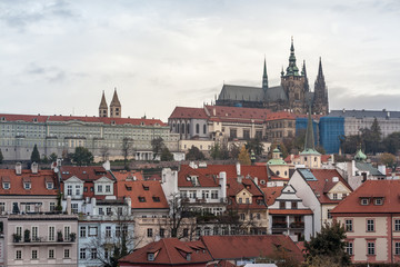 Naklejka na ściany i meble Panorama of the Old Town of Prague, Czech Republic, with a focus on Hradcany hill and the Prague Castle with the St Vitus Cathedral (Prazsky hill) seen from the Vltava river. 