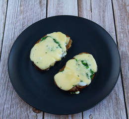 Whole grain bread with egg, herbs and cheese