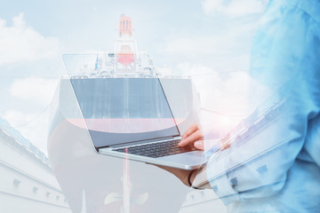 Double exposure worker and note book in hand in shipyard for ship repair