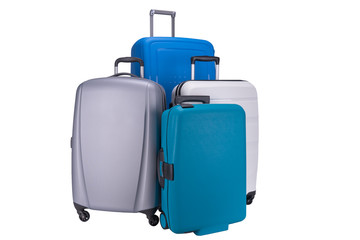 Four suitcases isolated on white background