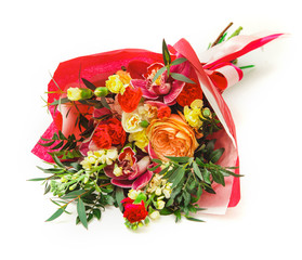 bouquet of roses, alstroemeria, carnations, orchids in wrapping paper on white