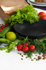 Vegan menu food background.  Ingredients for cooking healthy food on dark background top view