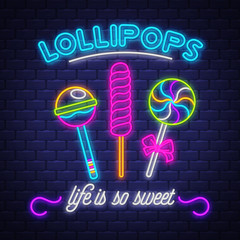 Lollipops Shop- Neon Sign Vector. Lollipops Shop - neon sign on brick wall background - 350850144