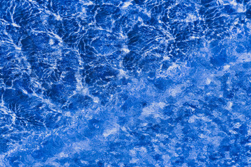  Blu water in swimming pool rippled water detail background