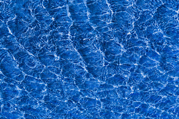  Blu water in swimming pool rippled water detail background