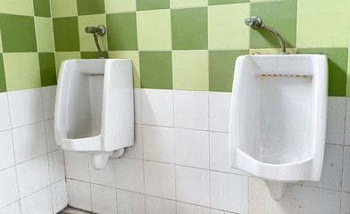 Men's white urinals design, Close up row of outdoor urinals men public toilet, Urinal concept.
