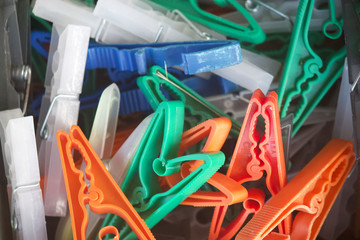 Closeup of a box of pegs used for hanging washing on the washing line