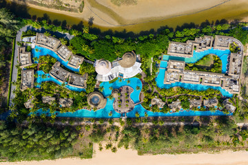 KHAO LAK, THAILAND - APRIL 19 2020: Aerial view of a closed hotel and deserted tropical beach in a major tourist area.  
