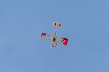 A model airplane on blue sky background