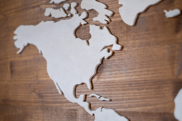 Handcrafted wooden world map with focus on Eastern USA and Canada