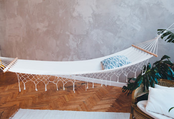 room interior with old floor and hammock