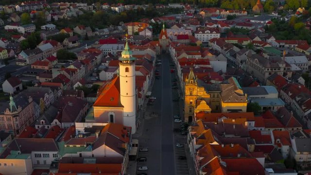 Aerial view to historic center of Domazlice city in sunset. Medieval town was first recorded as a town in 1231. Beautiful destination in Western Bohemia. Czech Republic, Central Europe.