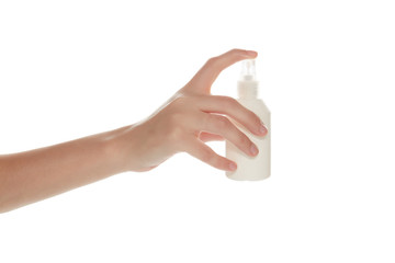 antiseptic spray on hand
