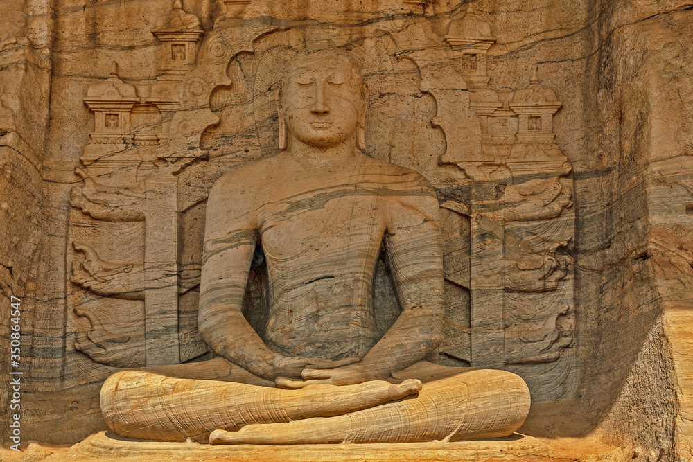 Wall mural buddha statue in granite rock at polonnaruwa, sri lanka. gal viharaya buddhist temple.