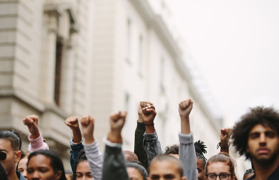 Arms raised in protest