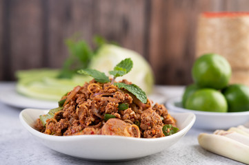 Spicy minced pork in a white plate.