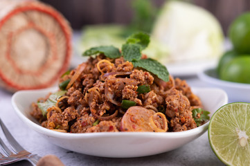 Spicy minced pork in a white plate.
