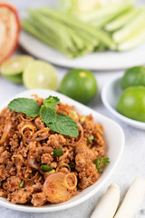 Spicy minced pork in a white plate.