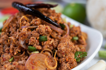 Spicy minced pork in a white plate.