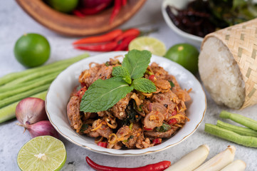Spicy minced pork in a white plate.
