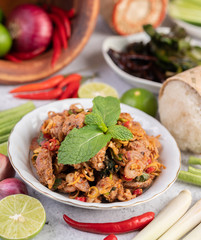Spicy minced pork in a white plate.