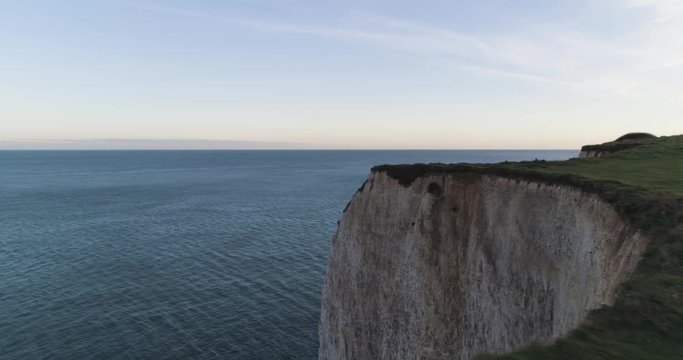 Flying over cliffs at Old Harry Rocks to reveal dramatic rock stacks
