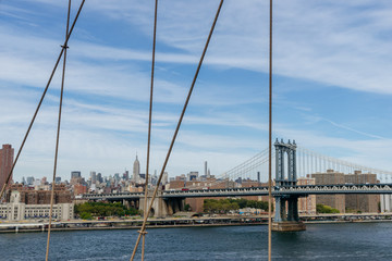 View of Manhattan bridge from Brooklyn Bridge in New York.