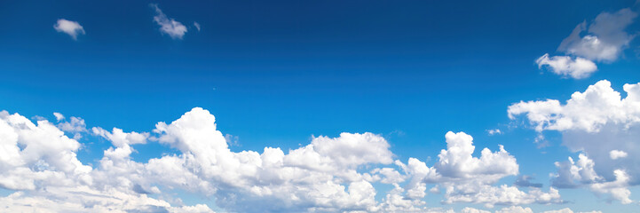 Cumulus cloudscape over New South Wales, Australia at a cloudy day in summer, edited as a panorama.