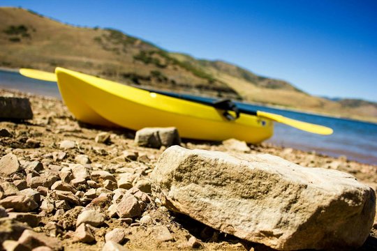 Kayak On Riverbank