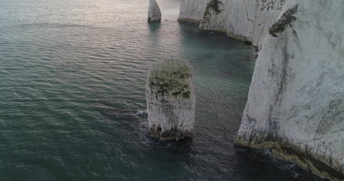 Dramatic rock stack at Old Harry Rocks, England coastline with huge cliffs