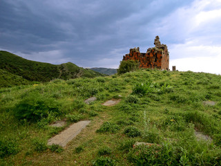 Fototapeta na wymiar Panoramic view on the abandoned ruins of the medieval church Amenaprkich in the monastic complex Havuts Tar, ruined during the earthquake, Khosrov State Reserve, near the village Garni, Armenia
