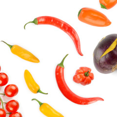 Cherry tomatoes, chili pepper and kohlrabi isolated on a white background.
