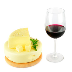 Red wine glass and cheese. Isolated on white .